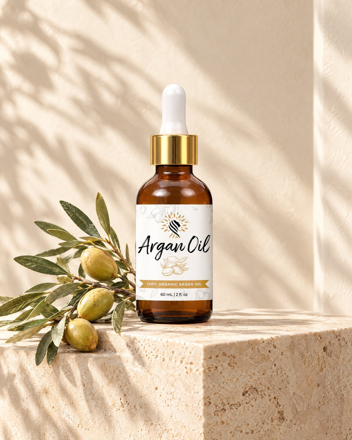 One bottle of Argan Oil on a travertine pedestal with soft leaf shadows
